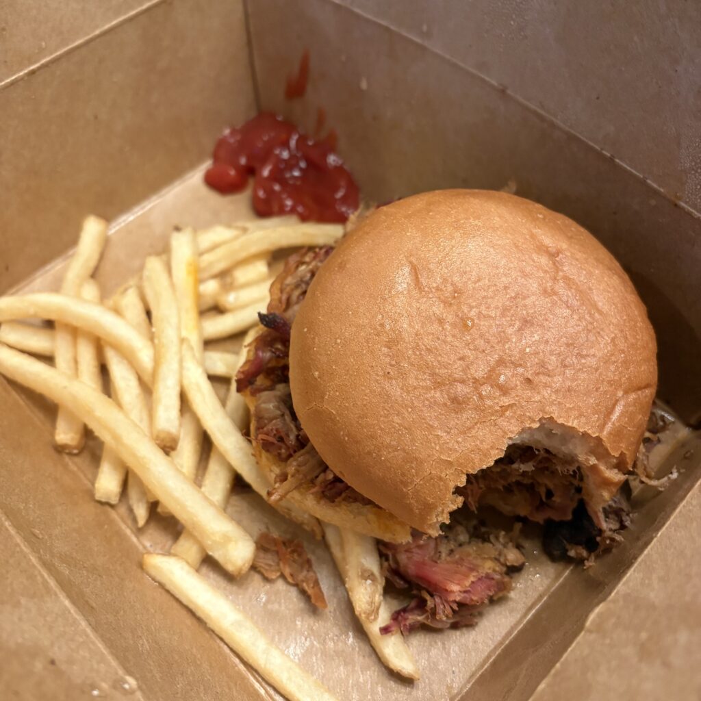 Gluten Free Pulled Pork Sandwich and fries. Gluten Free Disney World. Trailblazer Restaurant